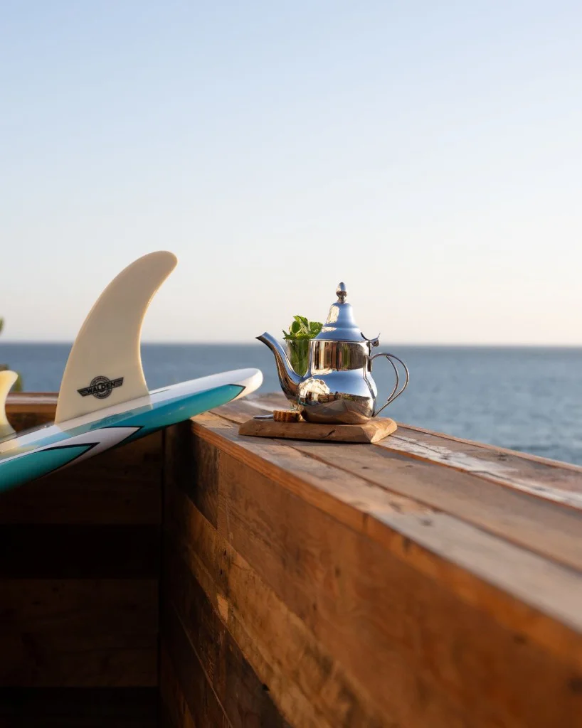 Surfboard rack and sunrise surf session in Agadir